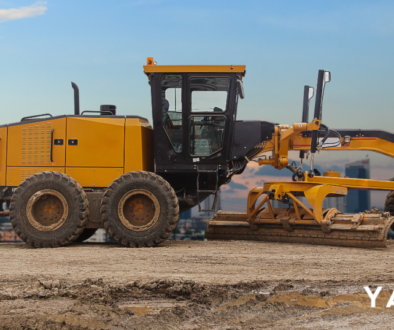 A Caterpillar 140 motor grader on a civil construction site in NSW