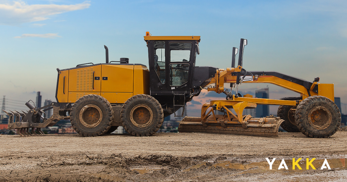 A Caterpillar 140 motor grader on a civil construction site in NSW