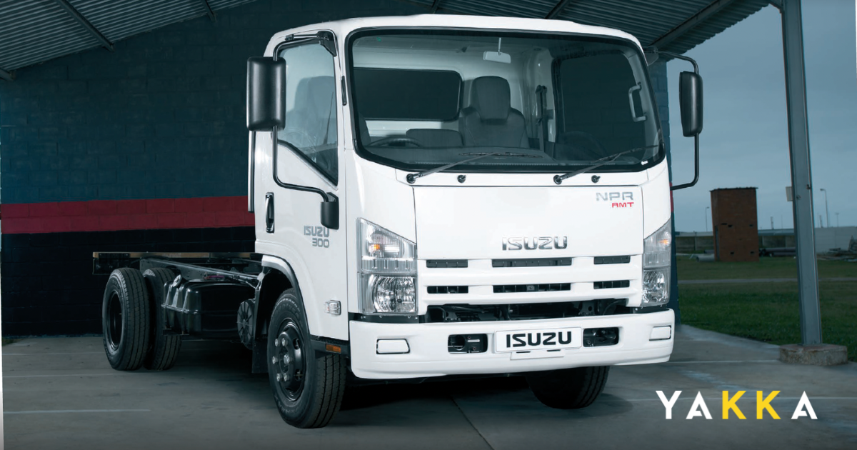An Isuzu truck branded for an electrical services company parked on a suburban street in Sydney